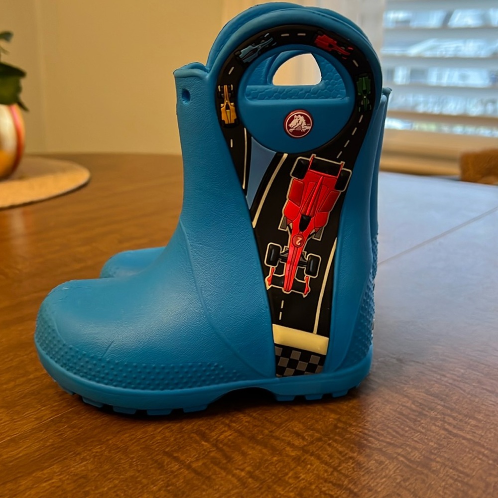 Crocs glow in the dark race car rain boots size 7